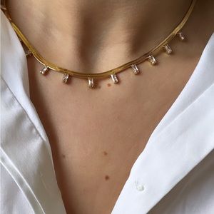 Gold choker necklace with drop crystals